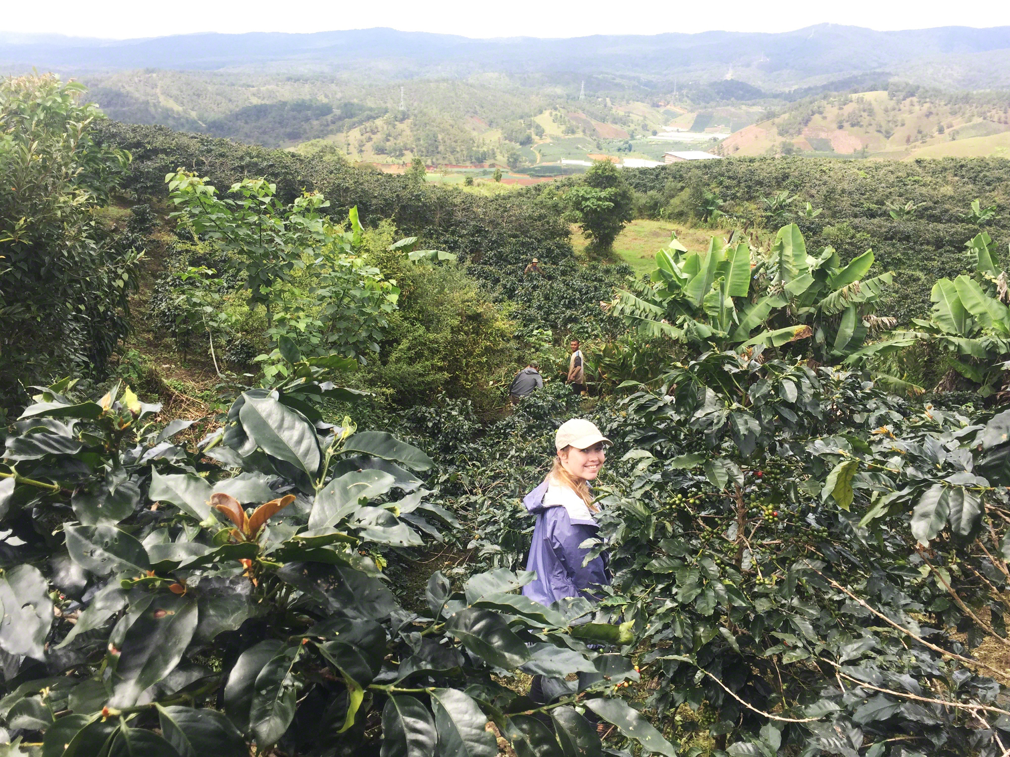Kaylee surrounded by coffee